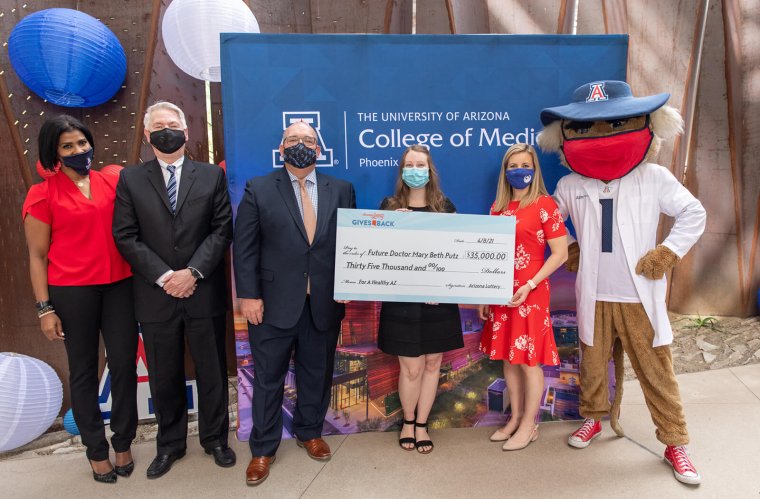 Medical Student Mary Beth Putz with Yetta Gibson, Dean Guy Reed, Arizona Lottery Executive Director Gregory Edgar, Mayor Kate Gallego and Wilbur Wildcat Medical Student Mary Beth Putz with Yetta Gibson, Dean Guy Reed, Arizona Lottery Executive Director Gregory Edgar, Mayor Kate Gallego and Wilbur Wildcat
