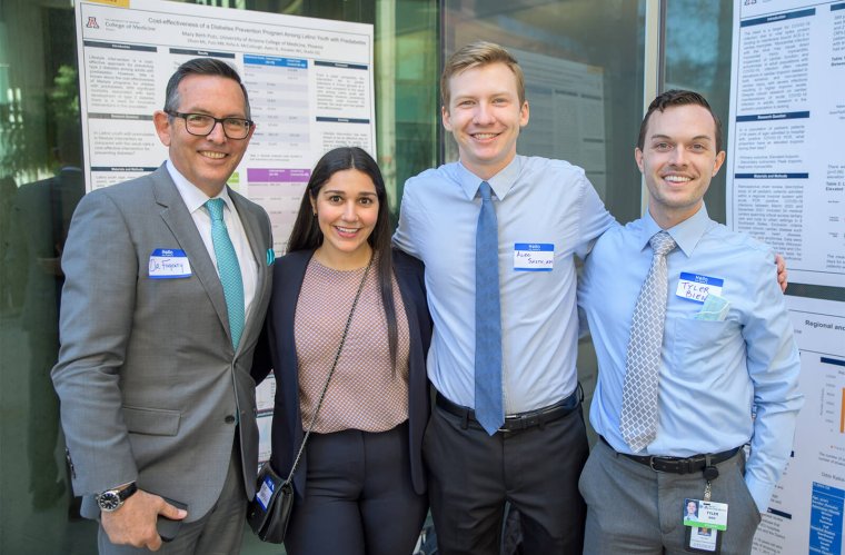Glen Fogerty, PhD, Associate Dean of Admissions and Recruitment, Stopped by the Symposium to Talk with Students About Their Research Glen Fogerty, PhD, Associate Dean of Admissions and Recruitment, Stopped by the Symposium to Talk with Students About Their Research