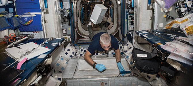 An Astronaut Floats through his ship