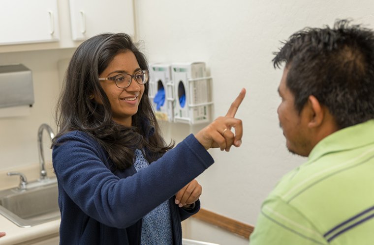 Medical Student, Megha Patel, Working with a Patient at the Wesley Community and Health Center Medical Student, Megha Patel, Working with a Patient at the Wesley Community and Health Center