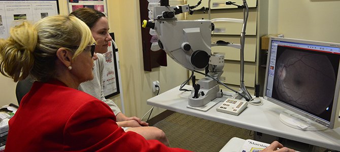 Dr. Mandi Conway with a Patient