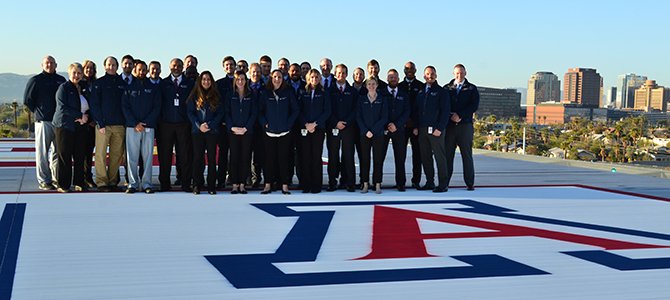 Orthopaedic Residency Staff and Residents on the Helipad at Banner